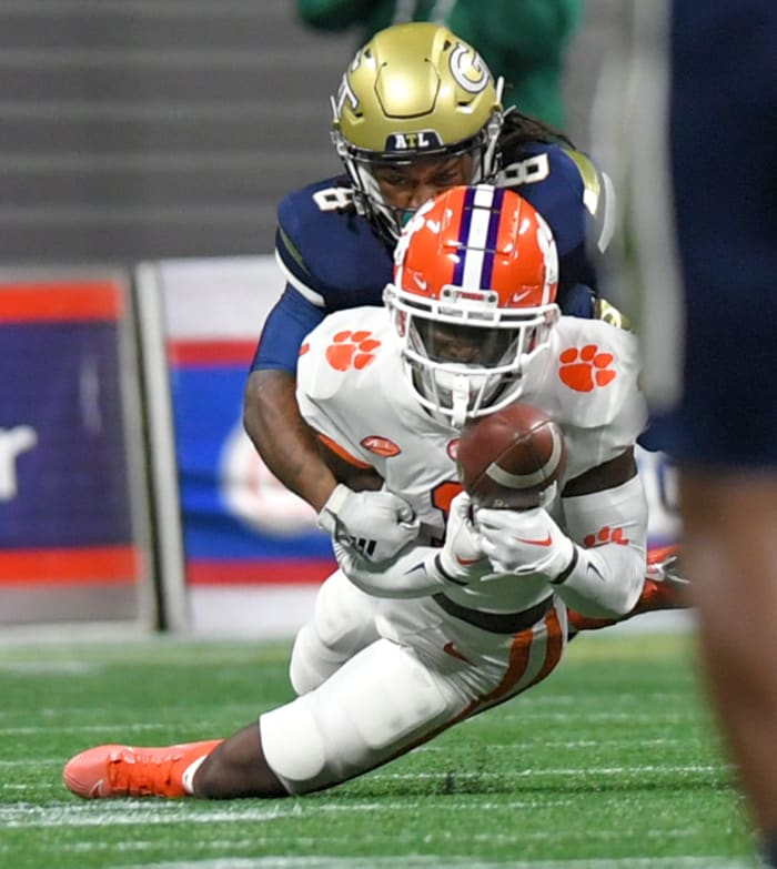 Clemson safety Andrew Mukuba intercepts a pass during a game against Georgia Tech.